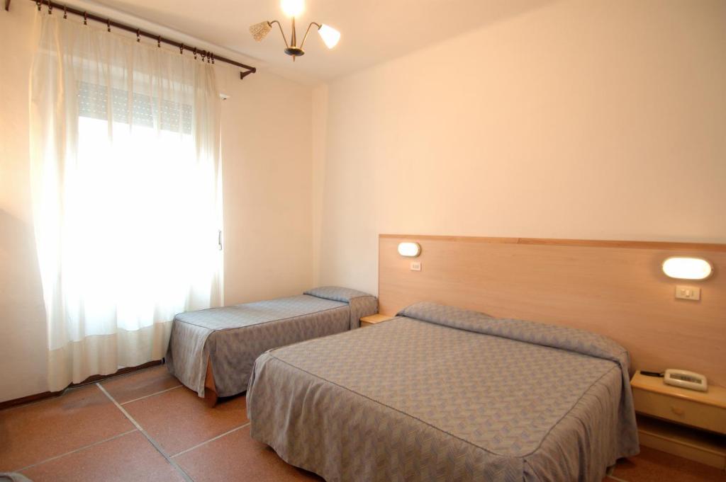Hotel Moderno Pisa Værelse billede